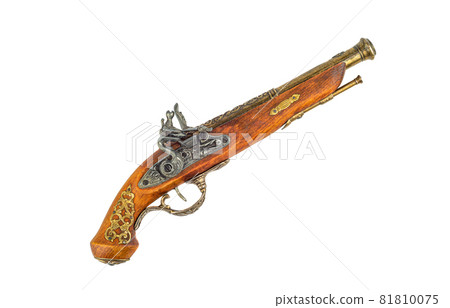 Model of an old powder pistol with bronze inlay. Isolated on white background. Model of an old powder pistol with bronze inlay. Isolated on white background. 81810075