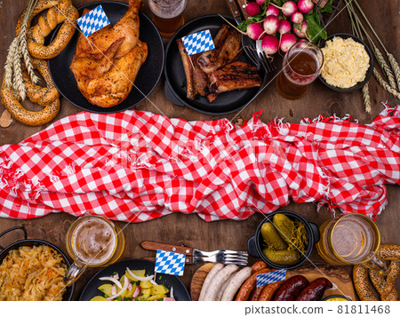 Oktoberfest dishes with beer, pretzel and sausage Oktoberfest dishes with beer, pretzel and sausage 81811468