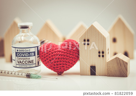 Herd immunity, Home model with love heart and Covid vaccine dose for social need vaccinate for Covid-19 prevention together concept Herd immunity, Home model with love heart and Covid vaccine dose for social need vaccinate for Covid-19 prevention together concept 81822059