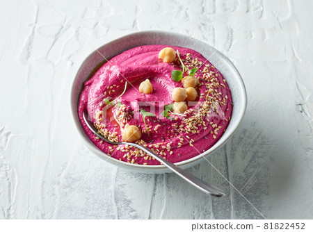 bowl of beetroot hummus bowl of beetroot hummus 81822452