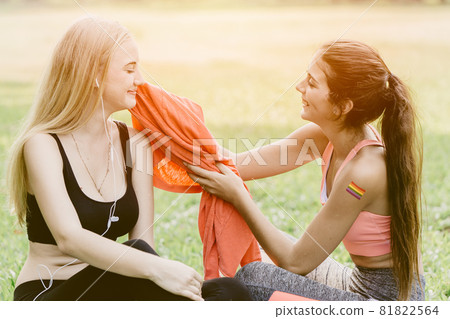 LGBT sport athlete healthy women teen girlfriends care support together. 81822564
