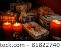 Christmas decoration with christmas bauble and candle for advent season four candles burning on dark 81822740