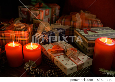 Christmas decoration with christmas bauble and candle for advent season four candles burning on dark 81822740