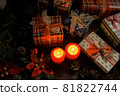 Christmas decoration with christmas bauble and candle for advent season four candles burning on dark 81822744
