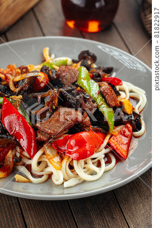 Uyghur guiru lagman noodles with ear mushrooms Uyghur guiru lagman noodles with ear mushrooms 81822917