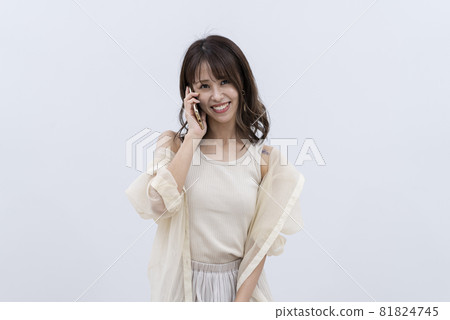 Woman using a smartphone Woman using a smartphone 81824745