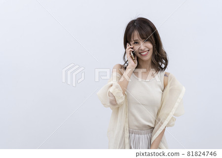 Woman using a smartphone Woman using a smartphone 81824746
