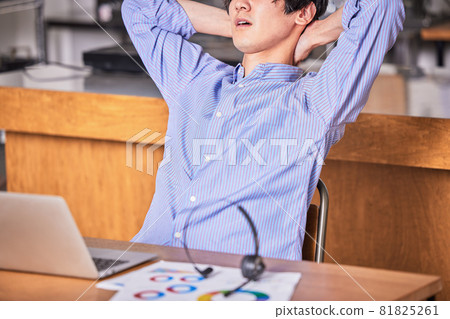 Telework (remote) tired young man Telework (remote) tired young man 81825261