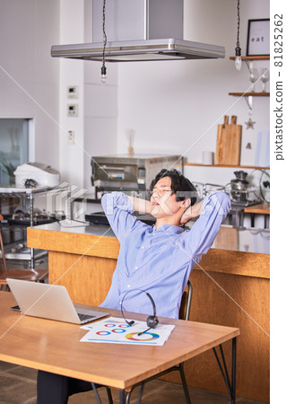 Telework (remote) tired young man 81825262