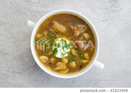 Overhead view of mushrooms and potato soup Overhead view of mushrooms and potato soup 81825408