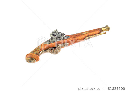 Vintage powder pistol with bronze inlay isolated on white background. Vintage powder pistol with bronze inlay isolated on white background. 81825600