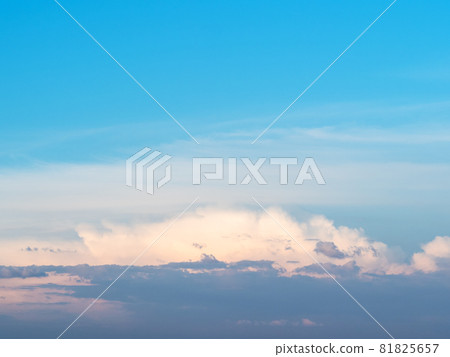 blue sunset sky with low dark gray, pink and white cloud in summer evening 81825657