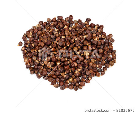 handful of grains of paradise pepper closeup on white background 81825675