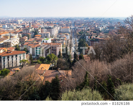 Travel to Italy - above view of Lower Town (Citta Bassa) with street viale Vittorio Emanuele II from Porta San Giacomo gate in Bergamo city, Lombardy Travel to Italy - above view of Lower Town (Citta Bassa) with street viale Vittorio Emanuele II from Porta San Giacomo gate in Bergamo city, Lombardy 81826186
