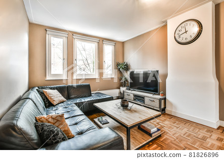 Interior of bright living room with stylish furniture 81826896