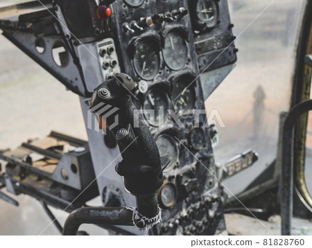 Damaged old war military helicopter control panel. 81828760