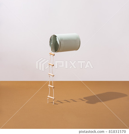 Pastel blue can with attached ladders. Minimalist concept. Pastel blue can with attached ladders. Minimalist concept. 81831570