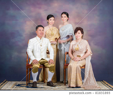Happy family wearing Thai traditional costume Happy family wearing Thai traditional costume 81831893