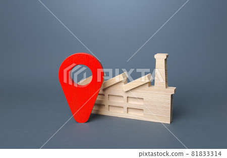 Industrial plant and red location pin. Domestic manufacturer factory. Concept of the location of production facilities. Investments and construction of industrial projects and complexes. Industrial plant and red location pin. Domestic manufacturer factory. Concept of the location of production facilities. Investments and construction of industrial projects and complexes. 81833314