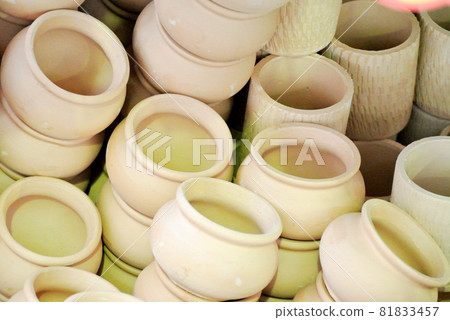 PERAK, MALAYSIA -JULY 9, 2016: Malay traditional pottery designs which have been commercialized and diversified designs and sizes. PERAK, MALAYSIA -JULY 9, 2016: Malay traditional pottery designs which have been commercialized and diversified designs and sizes. 81833457
