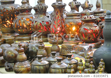PERAK, MALAYSIA -JULY 9, 2016: Traditional Malay water storage containers or Labu Sayong It is made of clay that has been in the process with a variety of attractive colors and patterns. PERAK, MALAYSIA -JULY 9, 2016: Traditional Malay water storage containers or Labu Sayong It is made of clay that has been in the process with a variety of attractive colors and patterns. 81833471