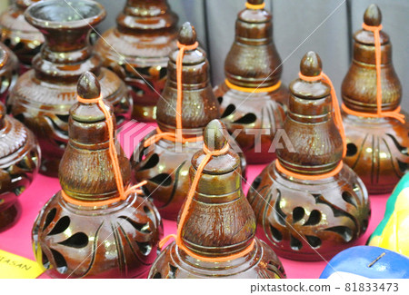 PERAK, MALAYSIA -JULY 9, 2016: Traditional Malay water storage containers or Labu Sayong It is made of clay that has been in the process with a variety of attractive colors and patterns. PERAK, MALAYSIA -JULY 9, 2016: Traditional Malay water storage containers or Labu Sayong It is made of clay that has been in the process with a variety of attractive colors and patterns. 81833473
