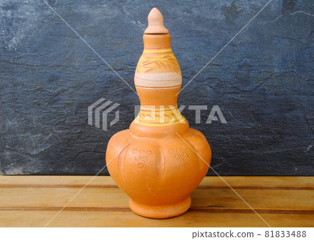PERAK, MALAYSIA -JULY 9, 2016: Traditional Malay water storage containers or Labu Sayong It is made of clay that has been in the process with a variety of attractive colors and patterns.  81833488