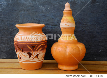 PERAK, MALAYSIA -JULY 9, 2016: Traditional Malay water storage containers or Labu Sayong It is made of clay that has been in the process with a variety of attractive colors and patterns.  81833489