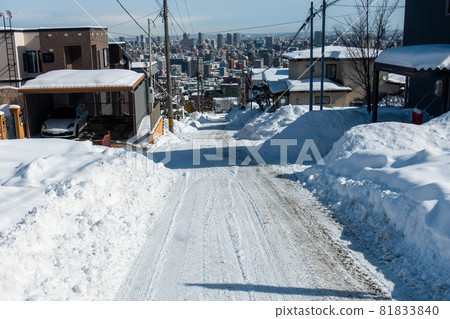 Winter slope down to the city center Residential area in Sapporo, Hokkaido Winter slope down to the city center Residential area in Sapporo, Hokkaido 81833840