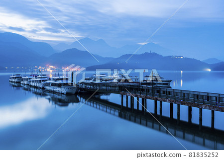 The scenery of yachts Marina at Sun Moon Lake in the morning, the famous attraction in Nantou, Taiwan. The scenery of yachts Marina at Sun Moon Lake in the morning, the famous attraction in Nantou, Taiwan. 81835252