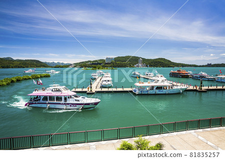 The scenery of yachts Marina at Sun Moon Lake in the morning, the famous attraction in Nantou, Taiwan. The scenery of yachts Marina at Sun Moon Lake in the morning, the famous attraction in Nantou, Taiwan. 81835257
