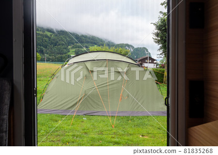 The view from inside the motorhome directly to the tourist tent The view from inside the motorhome directly to the tourist tent 81835268