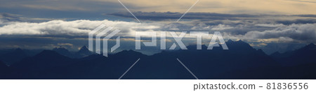 Moody sky over Mount Grosser Mythen and other mountains of the Swiss Alps. 81836556