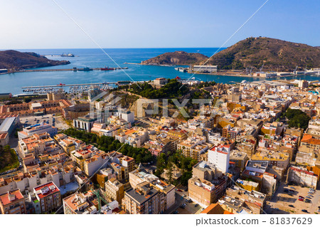 Aerial view of Cartagena port city with buildings and coast line, Murcia 81837629