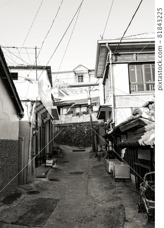 Black and white photo of a village alley Black and white photo of a village alley 81843225
