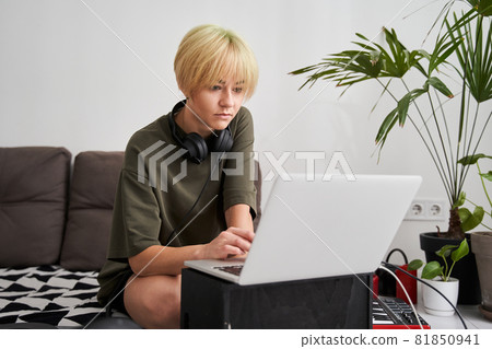 Woman editing and making electronic music 81850941