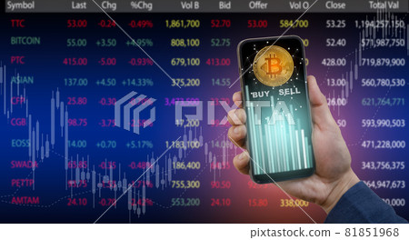 Smartphone with Bitcoin chart on-screen among piles of Bitcoin concept.businessman touch on mobile app screen with big BUY and SELL buttons. Bitcoin on stock market, Cryptocurrency and finance. 81851968