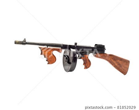 Thompson submachine gun with cartridge magazine isolated on white background. 81852029