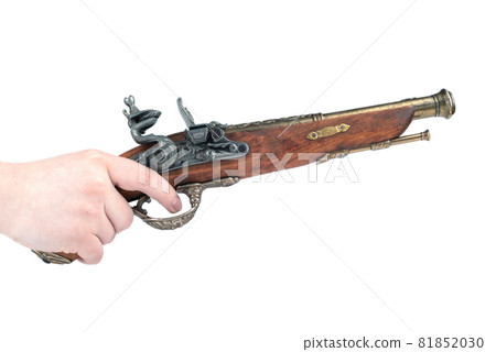 Human hand on the trigger of a mock-up of an old pistol. Human hand on the trigger of a mock-up of an old pistol. 81852030