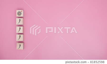 Arranging wood block stacking as step stair go to target on pink background, Business concept growth success process. copy space. Arranging wood block stacking as step stair go to target on pink background, Business concept growth success process. copy space. 81852598