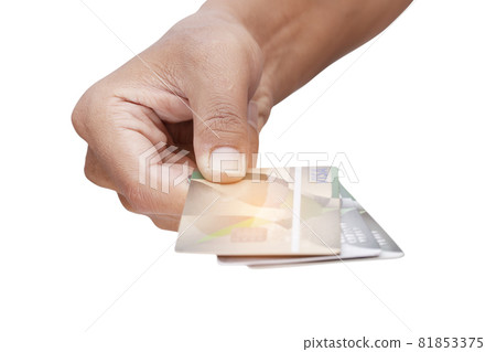 Hand holding credit card isolated on white background - clipping paths. Hand holding credit card isolated on white background - clipping paths. 81853375