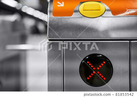 Closeup of electronic turnstile at subway station platform. Gates are closed. Automatic access system control, check point. Pass through the passes. Closeup of electronic turnstile at subway station platform. Gates are closed. Automatic access system control, check point. Pass through the passes. 81853542