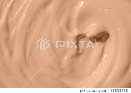 Cosmetic tonal moisturizer, bb cream swatch sample. Beige nude liquid foundation texture, concealer smear smudge drop. Make up base, cream textured background. 81853718