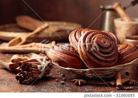 Freshly baked sweet cinnamon buns. 81860893