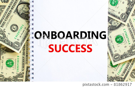 Onboarding success symbol. Words 'Onboarding success' on white note. Beautiful background from dollar bills. Business, onboarding success concept. Copy space. Onboarding success symbol. Words 'Onboarding success' on white note. Beautiful background from dollar bills. Business, onboarding success concept. Copy space. 81862917
