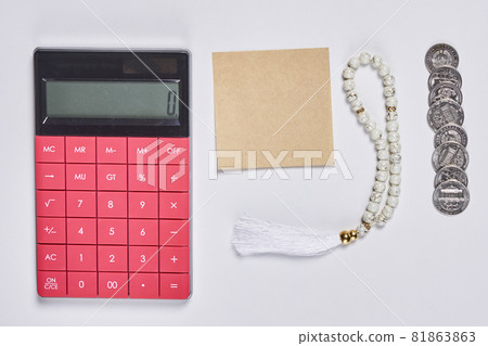 Concept of islamic finance on white background. Sharia-compliant finance - banking or financing activity. Coins and praying beads. Zakat, islamic banking 81863863
