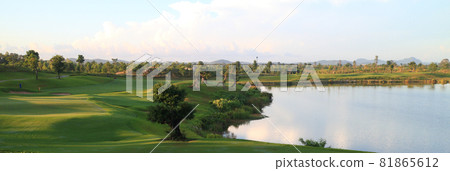 Golf course, lake, sky and green grass,Tropical golf course at sunset, Thailand 81865612