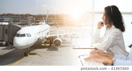 customer support operator against a cloudy sky with airplane, call center service airplane 81865860