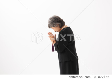 Senior woman funeral gassho Senior woman funeral gassho 81872166