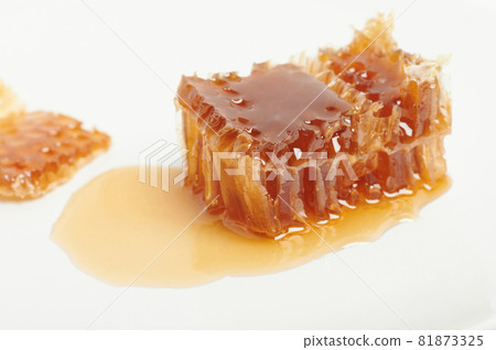 Honey with propolis on plate Honey with propolis on plate 81873325